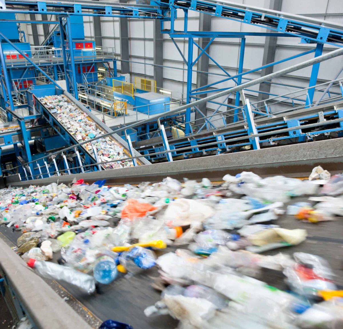vertical-shot-of-plastic-moving-along-conveyor-bel-2026-03-26-09-13-07-utc